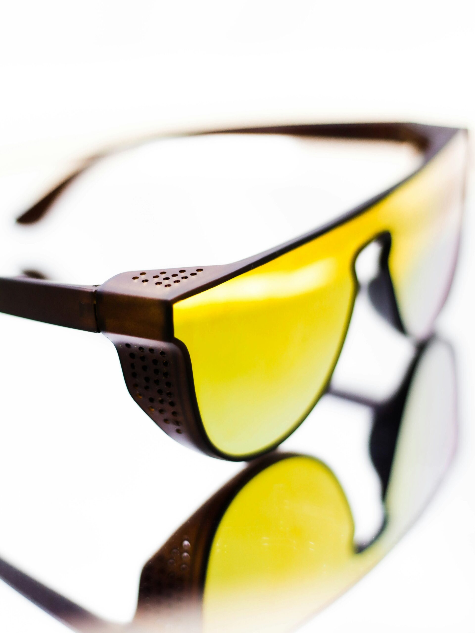 Protective eyewear with yellow-tinted lenses, essential for maintaining clear vision and safeguarding gear from damage in competitive Nerf battles.