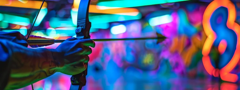 Realistic close-up of a player's hand holding a recurve bow with a foam-tipped arrow, ready to shoot in an indoor archery tag arena. The background has colorful graffiti walls and glowing lights. The person's arm is clearly visible. The image is focused on the bow and arrow with a blurry background. The bow can be green or black, and the arrow should have a soft foam tip for safety.